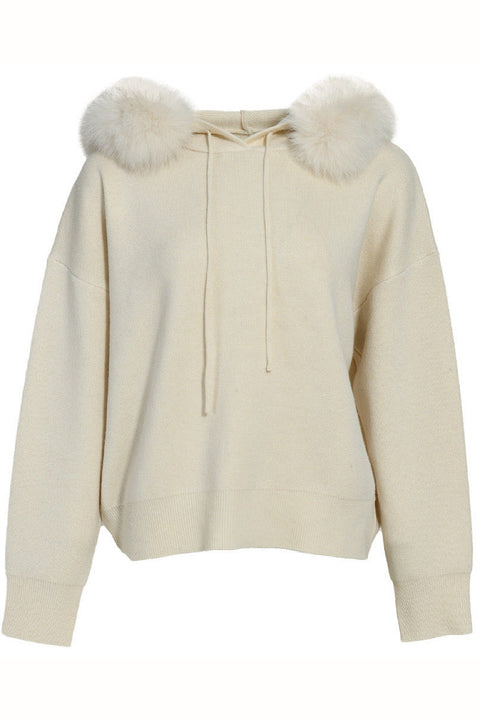 Relaxed-fit cashmere and wool blend sweater featuring a soft texture, ribbed cuffs, and clean crew neckline — ideal for cozy layering in cold weather.