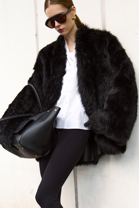 Manteau en peau lainée