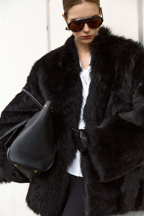 Manteau en peau lainée