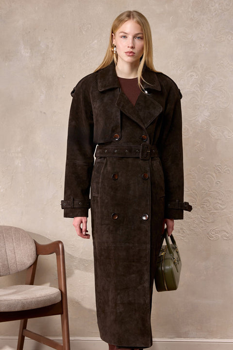 Woman dressed elegantly in the Hatti suede leather trench coat, showcasing its premium suede texture and classic yet contemporary silhouette.
